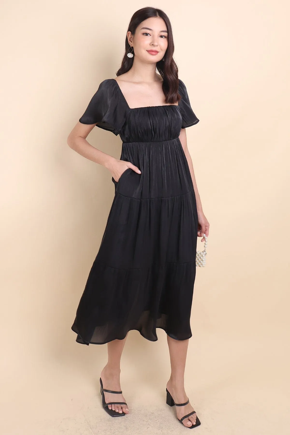 BELLE FLUTTERS SHIMMERY MIDAXI IN BLACK