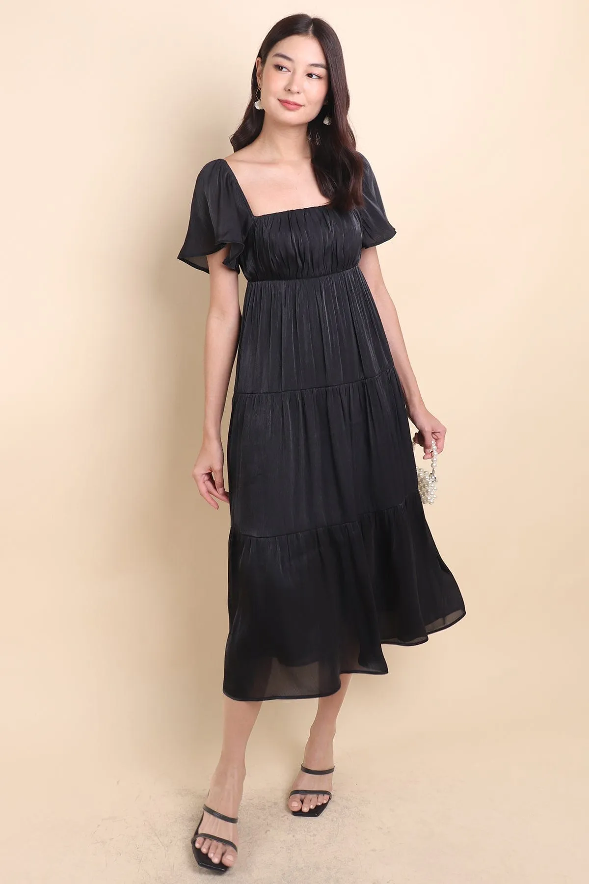 BELLE FLUTTERS SHIMMERY MIDAXI IN BLACK