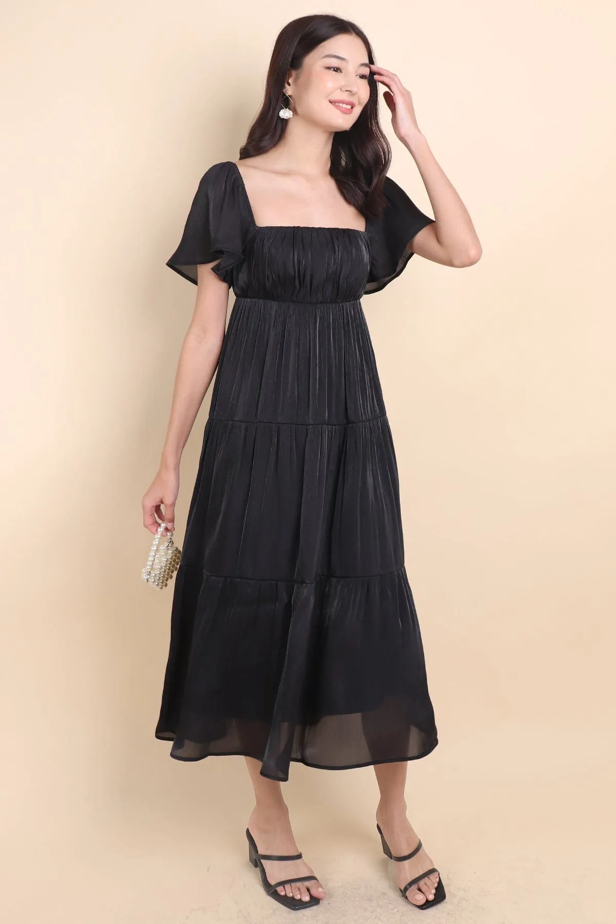 BELLE FLUTTERS SHIMMERY MIDAXI IN BLACK