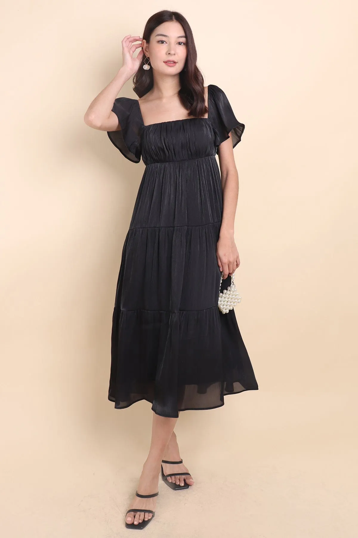 BELLE FLUTTERS SHIMMERY MIDAXI IN BLACK