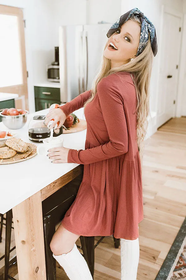 Give It A Twirl Babydoll Dress In Rust