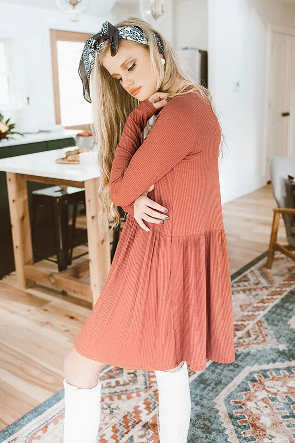 Give It A Twirl Babydoll Dress In Rust